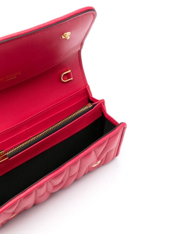 22718251_52935677_1000.jpg Moschino logo-quilted crossbody bag
