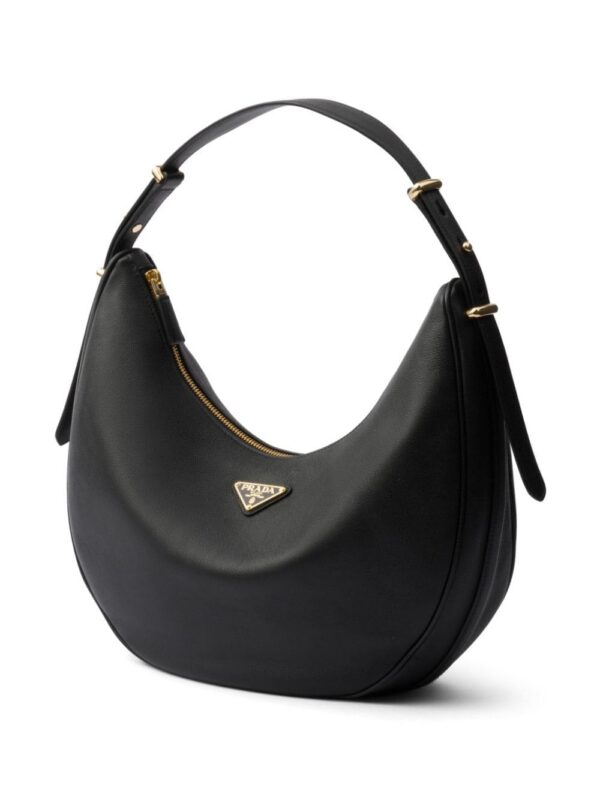 22729069_52708808_1000.jpg Prada large logo-plaque leather shoulder bag