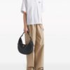 22729069_52708821_1000.jpg Prada large logo-plaque leather shoulder bag