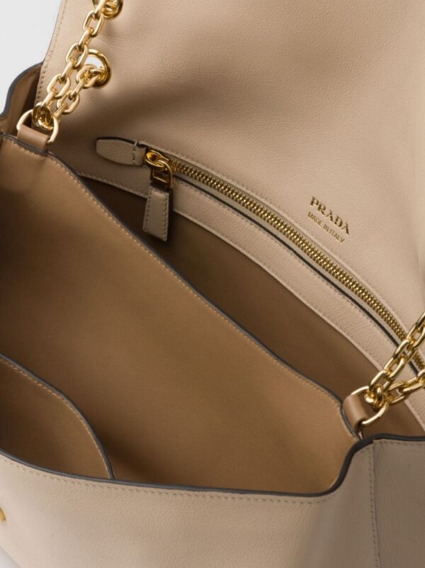 22844144_52879476_1000.jpg Prada medium logo-debossed shoulder bag