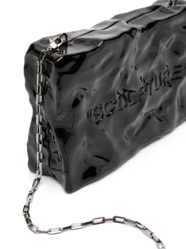 22847559_53161827_1000.jpg Off-White Quote textured clutch bag