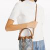 22928707_52967676_1000.jpg Tory Burch T Monogram denim mini bag