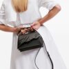 22999657_53447941_1000.jpg Karl Lagerfeld x Amber Valletta Mirum top-handle bag