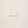22H213BA002-3065-120_1_main.jpg Jacquemus Le Chiquito moyen Signature handbag.