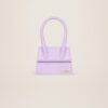22H213BA002-3065-640_1_main.jpg Jacquemus Le Chiquito moyen Signature handbag.