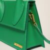 22H213BA003-3037-550_13.jpg Jacquemus Le grand Chiquito Large signature handbag.