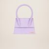 22H213BA003-3065-640_1_main.jpg Jacquemus Le grand Chiquito Large signature handbag.