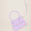 22H213BA003-3065-640_4.jpg Jacquemus Le grand Chiquito Large signature handbag.