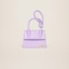 22H213BA005-3065-640_5.jpg Jacquemus Le Chiquito Noeud Coiled handbag.