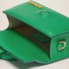 22H213BA006-3037-550_14.jpg Jacquemus Le Bambino Crossbody flap bag.
