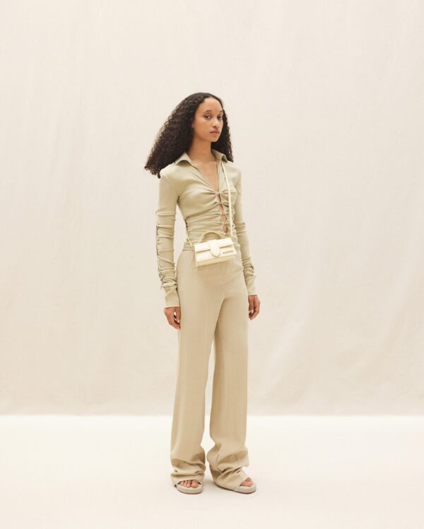 22H213BA006-3060-120_10-scaled-1.jpg Jacquemus Le Bambino Mini flap bag.