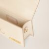 22H213BA006-3060-120_4.jpg Jacquemus Le Bambino Mini flap bag.