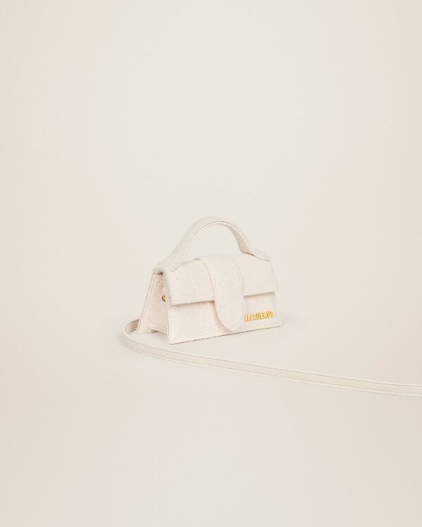 22H213BA006-3078-110_2.jpg Jacquemus Le Bambino Mini flap bag.