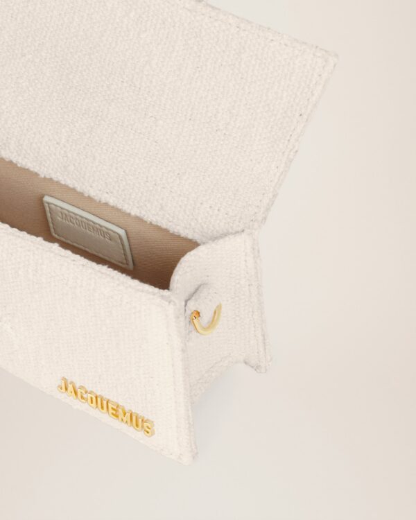 22H213BA006-3078-110_4.jpg Jacquemus Le Bambino Mini flap bag.