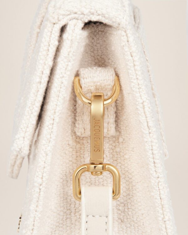 22H213BA007-3078-110_5.jpg Jacquemus Le grand Bambino Crossbody flap bag.