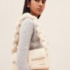 22H223BA027-3095-120_11-scaled-1.jpg Jacquemus e Bambidou Shearling flap bag.