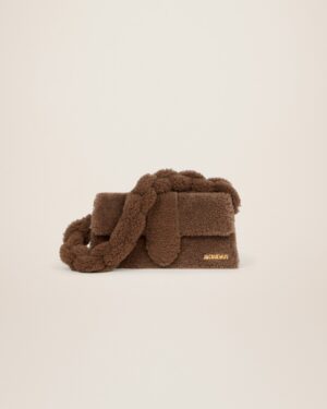 22H223BA027-3095-850_1_main.jpg Jacquemus Le Bambidou Shearling flap bag.