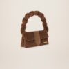 22H223BA027-3095-850_3.jpg Jacquemus Le Bambidou Shearling flap bag.