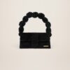 22H223BA027-3095-990_2.jpg Jacquemus Le Bambidou Shearling flap bag.