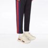 12562683_22090057_1000.jpg Gucci Rhyton-logo leather sneakers
