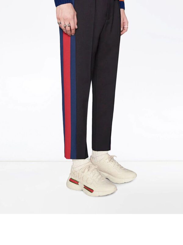 12562683_22090057_1000.jpg Gucci Rhyton-logo leather sneakers