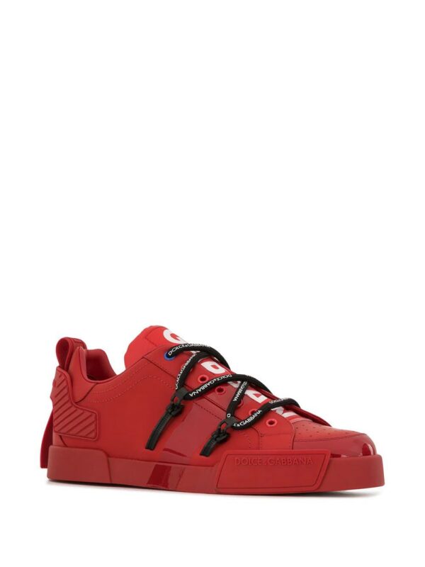 14694765_25969196_1000-1.jpg Dolce & Gabbana Portofino logo-embossed sneakers