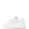 16260082_32342174_1000.jpg Versace Greca logo-print low-top sneakers