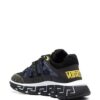 16818272_34842653_1000.jpg Versace Trigreca panelled cut-out sneakers