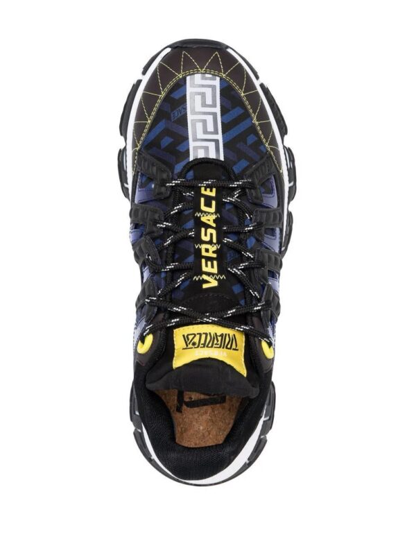 16818272_34844177_1000.jpg Versace Trigreca panelled cut-out sneakers