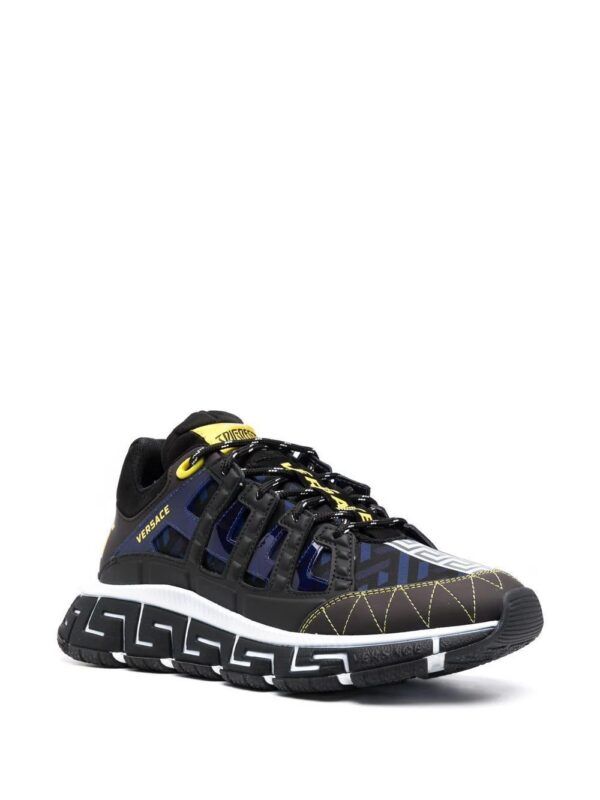 16818272_34844187_1000.jpg Versace Trigreca panelled cut-out sneakers