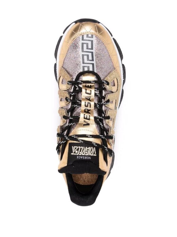 17336098_37159643_1000.jpg Versace Trigreca panelled cut-out sneakers