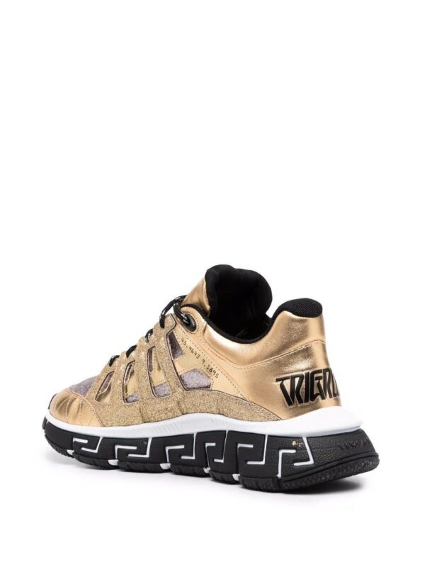17336098_37159649_1000.jpg Versace Trigreca panelled cut-out sneakers