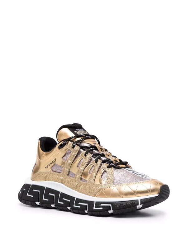 17336098_37160344_1000.jpg Versace Trigreca panelled cut-out sneakers