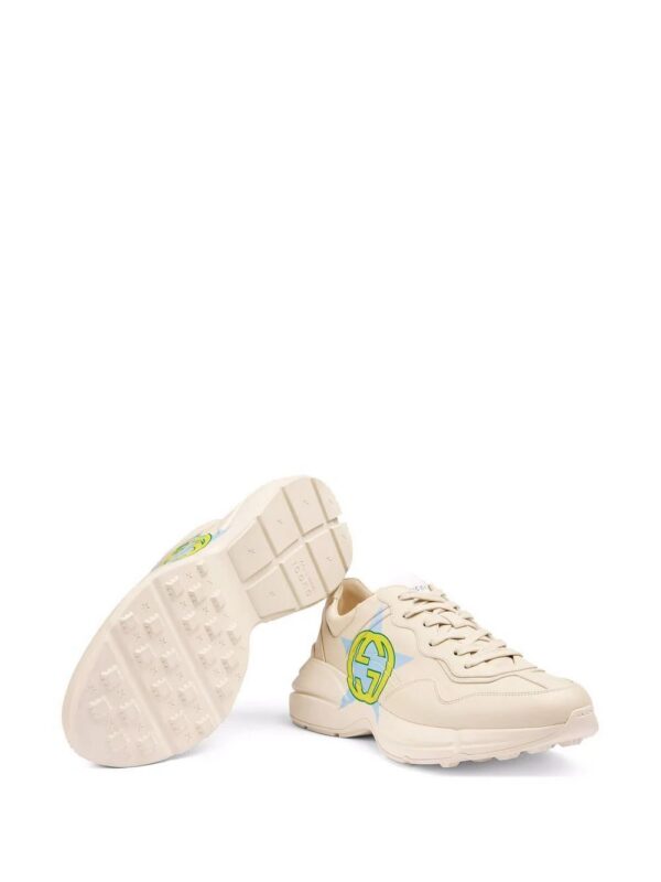 18187712_38631395_1000-1.jpg Gucci Rhyton star-print sneakers