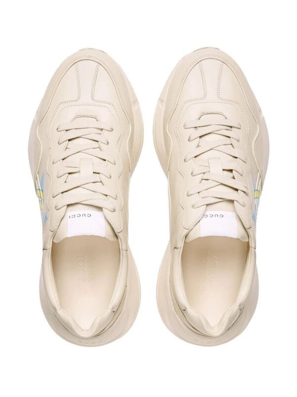 18187712_38631396_1000-1.jpg Gucci Rhyton star-print sneakers