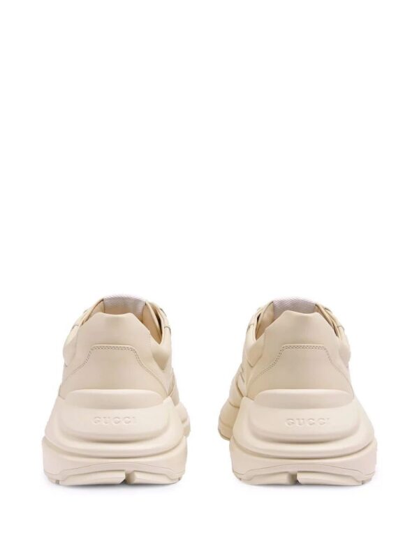 18187712_38632284_1000-1.jpg Gucci Rhyton star-print sneakers