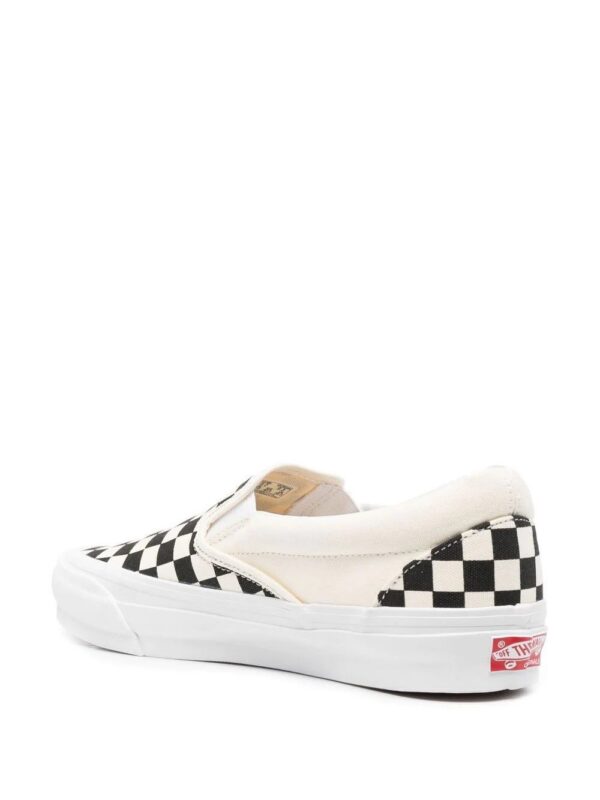 18576409_40095877_1000.jpg Vans Classic slip-on sneakers.