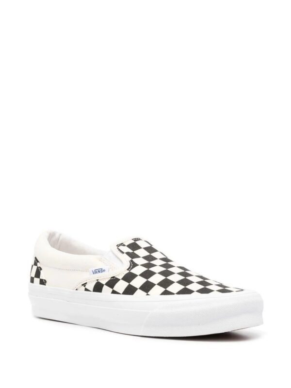 18576409_40095879_1000.jpg Vans Classic slip-on sneakers.