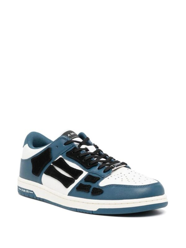 18986601_41417114_1000.jpg Amiri panelled low-top sneakers