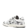 19665443_43978406_1000-1.jpg AMIRI abstract-print low-top sneakers