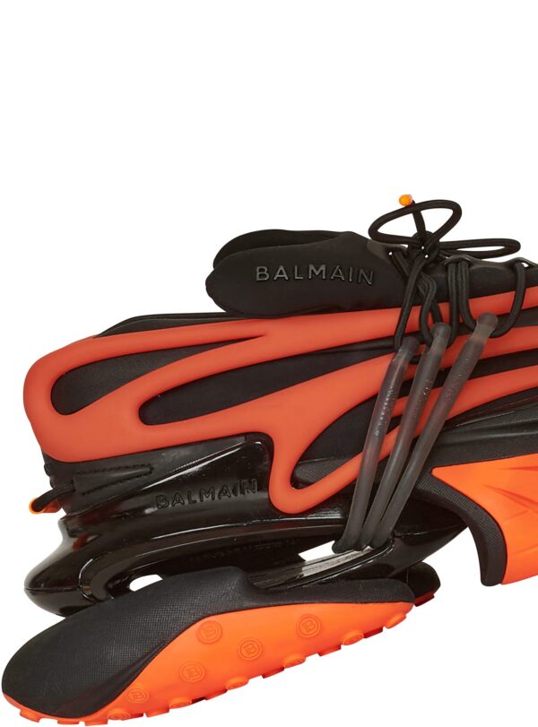 YM1VJ309KNCAEBAH-1.jpg Balmain Neoprene and leather Unicorn low-top sneakers