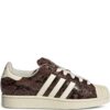 imgi_1_31748118_62470567_1000.jpg adidas snakeskin striped sneakers