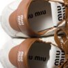 imgi_3_32261581_62249786_1000.jpg Miu Miu Deco leather sneakers