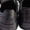 imgi_3_32462312_62707956_1000.jpg Miu Miu buckle-strap leather sneakers