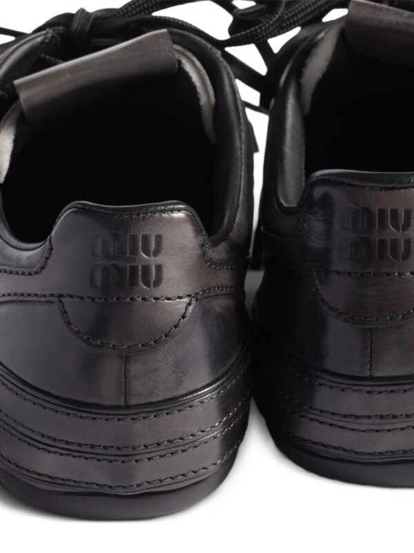 imgi_3_32462312_62707956_1000.jpg Miu Miu buckle-strap leather sneakers