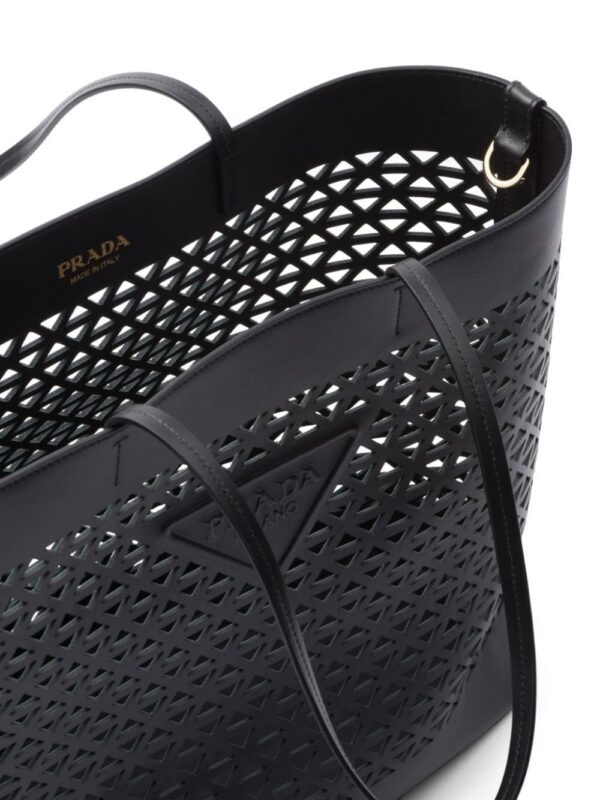 23048910_53161988_1000.jpg Prada logo-perforated leather tote bag
