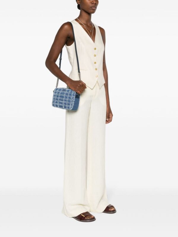23095036_53262311_1000.jpg Michael Michael Kors patchwork-design denim crossbody bag