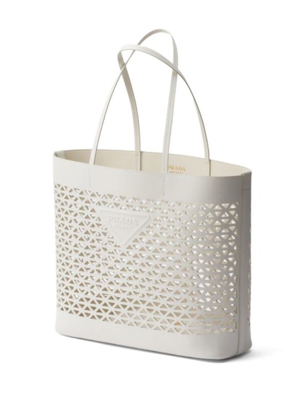 23245228_53296089_1000.jpg Prada logo-perforated leather tote bag