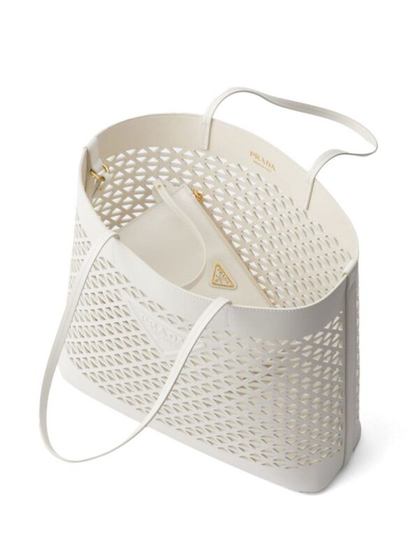 23245228_53296094_1000.jpg Prada logo-perforated leather tote bag