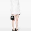 23285731_53471866_1000.jpg Moschino logo-lettering mini bag
